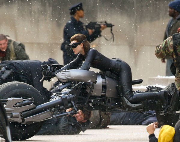 Catwoman Anne Hathaway Rides A Futuristic Motorcyle On Set